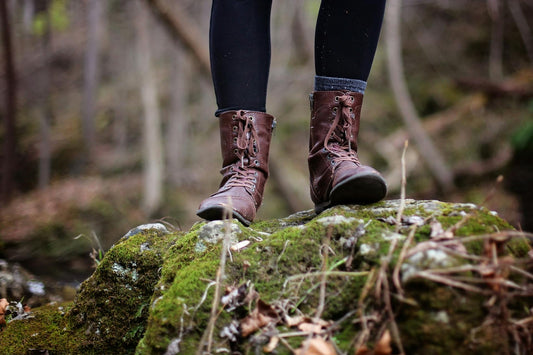 A person wearing boots in a forest